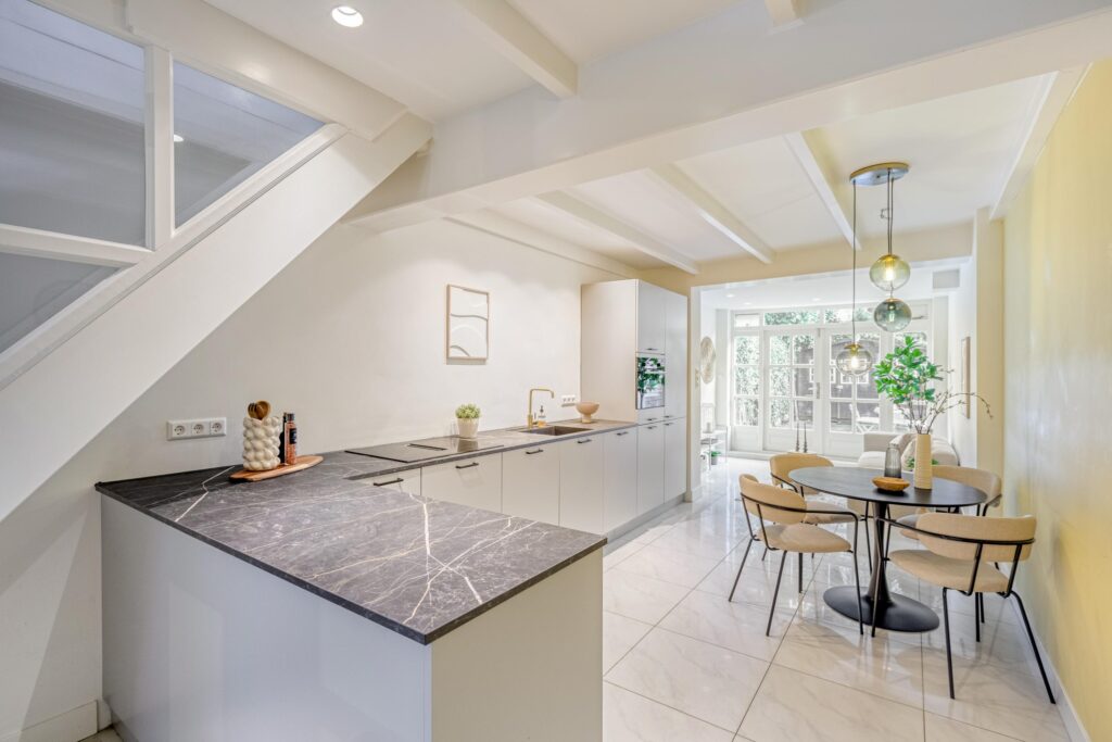 Modern kitchen and dining area with natural light