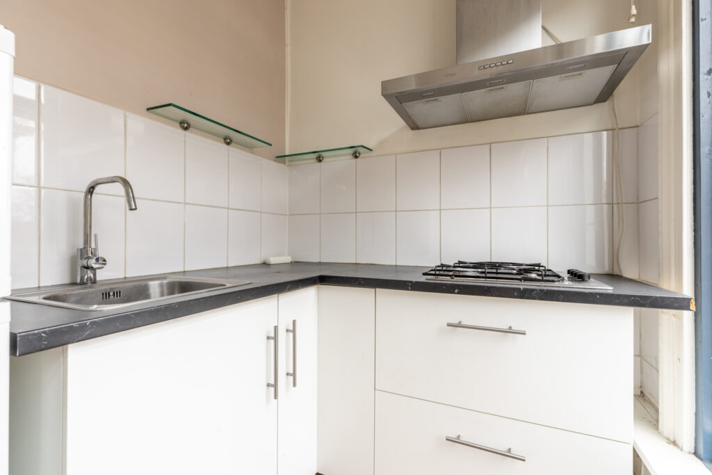 Modern kitchen with sink and stovetop