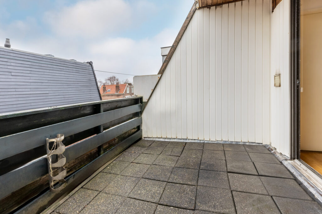 Rooftop terrace with cloudy sky view
